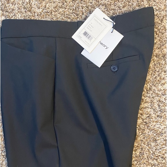 Hook-and-eye closure, belt loops. Off-seam front pockets,small size 14. - Picture 2 of 7